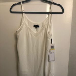 1.State tank with pretty sheer trim at top